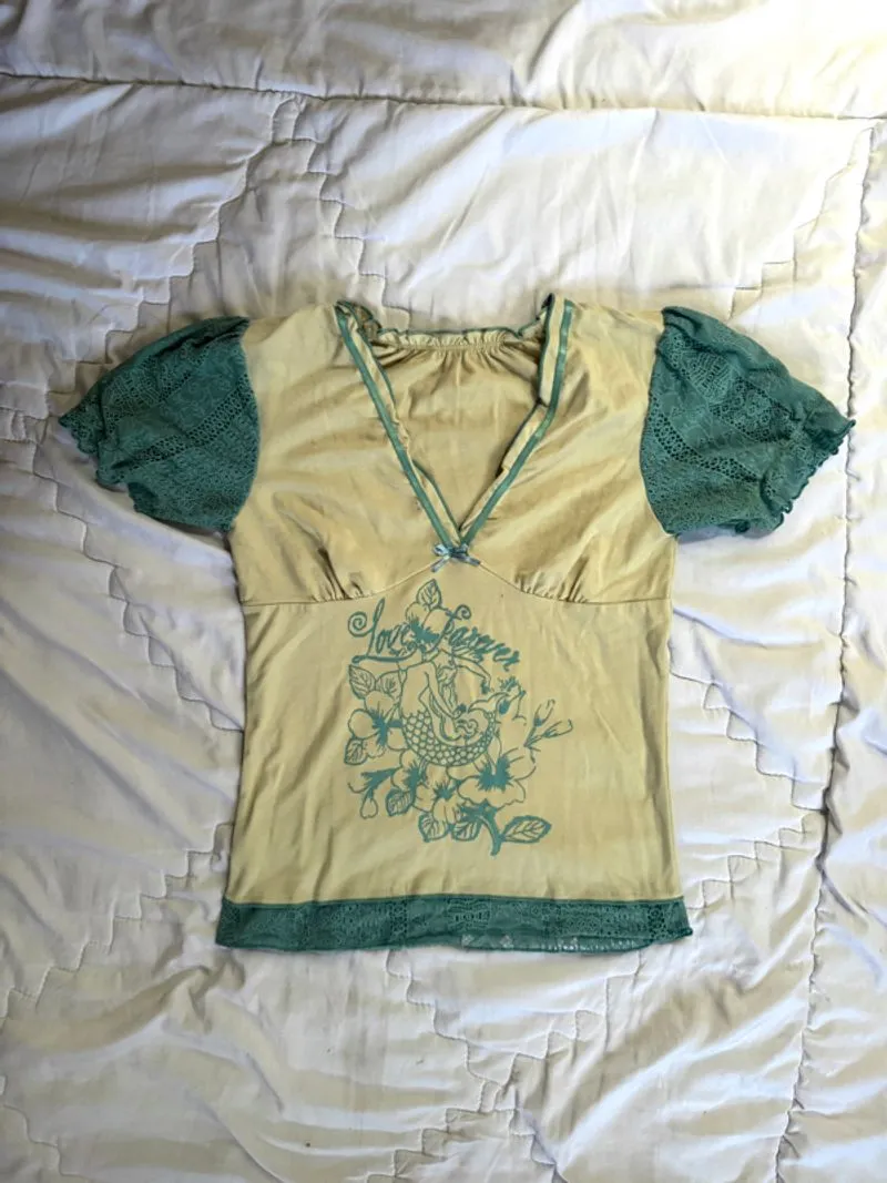 Cream and teal low neck lace sleeves graphic babydoll top photo 1