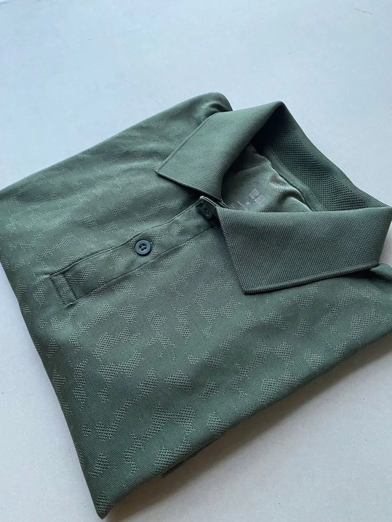 Uniqlo Sportswear Casual Polo shirt Pria green photo 1