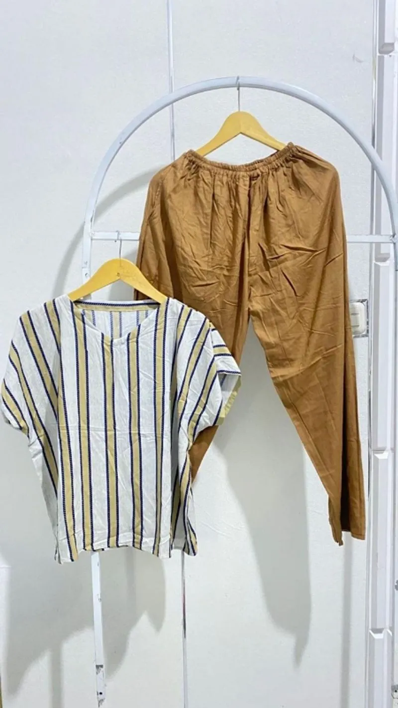 Babydol Celana Panjang Lengan Pendek
Krah V
Bahan Rayon Prem photo 1