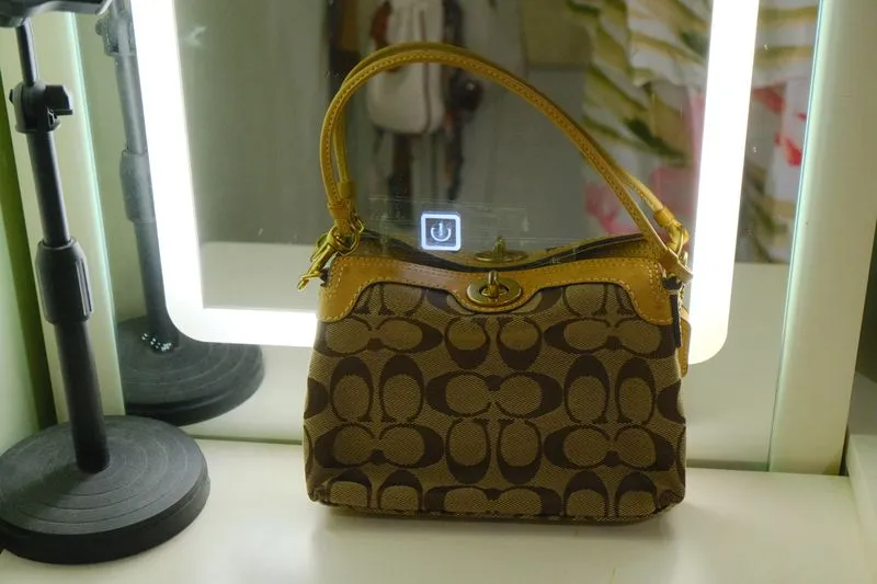 Preloved Coach vintage y2k signature mocha mini bag wristlet photo 1