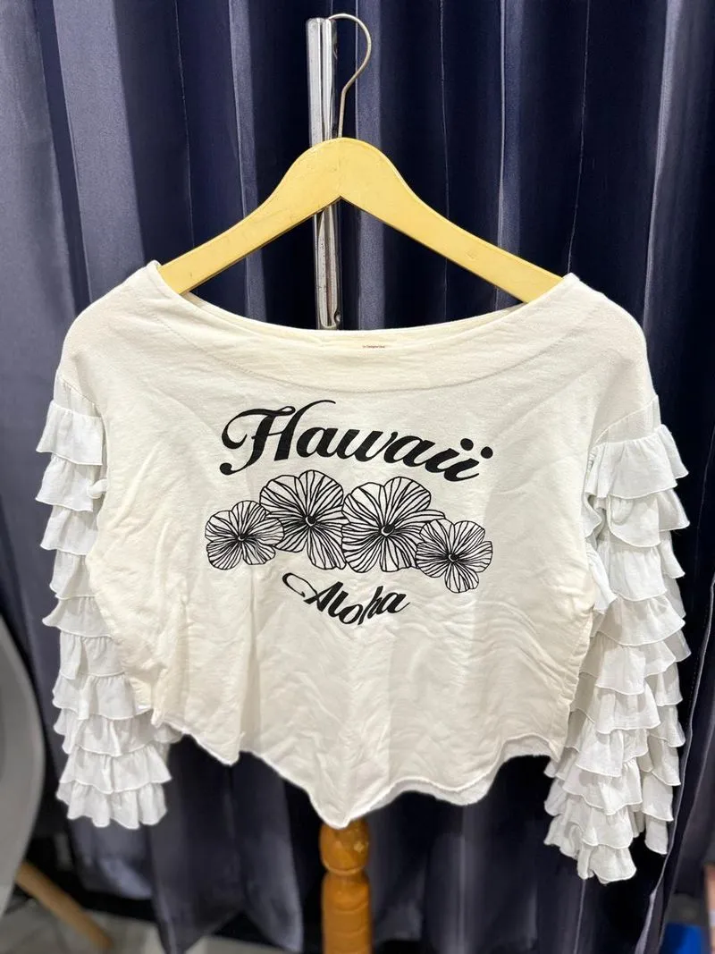 CROP TOP PUTIH LENGAN RUFLLE  photo 1