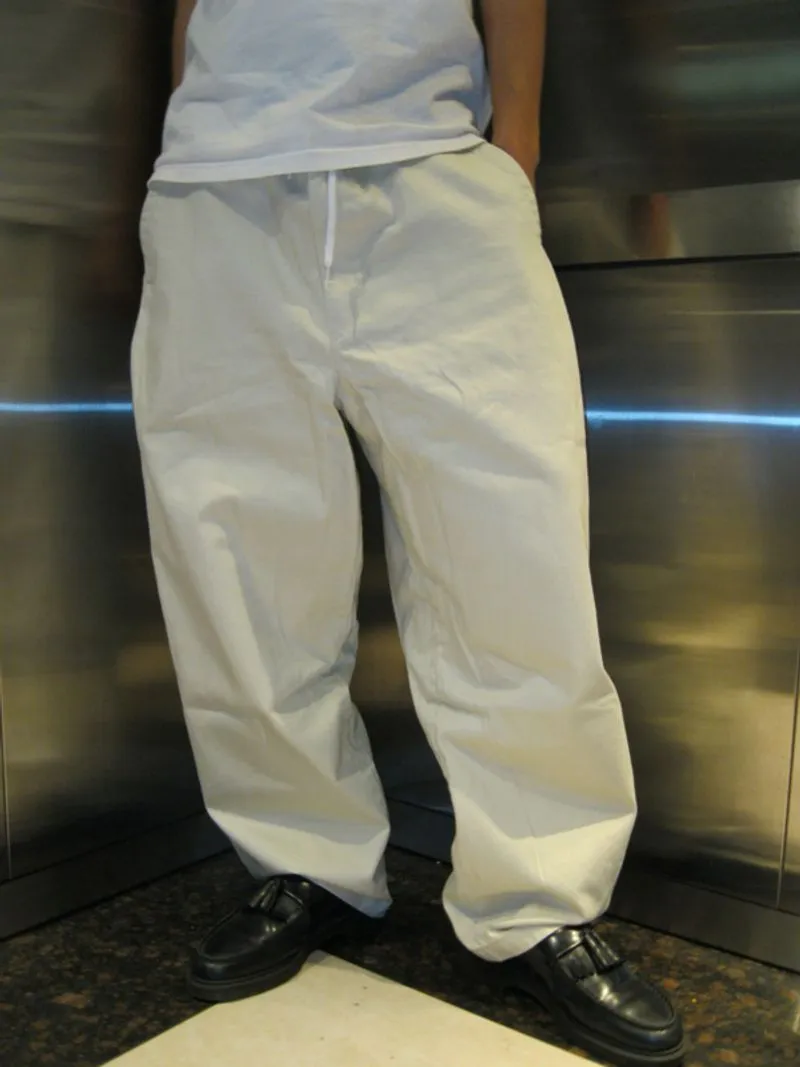 uniqlo baggy cream chinos  photo 1
