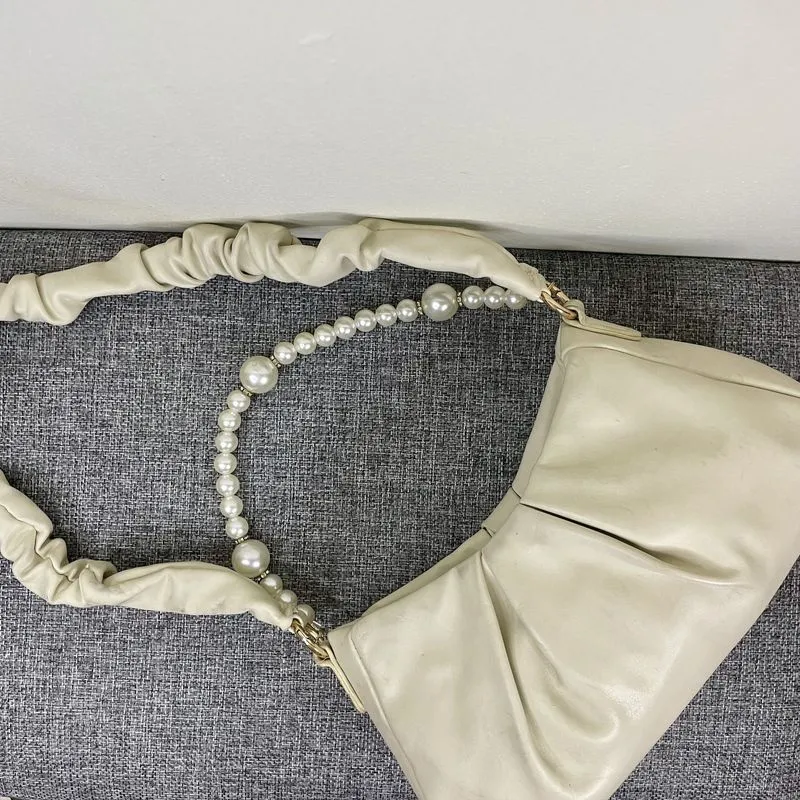 NEGO Tas Cewek Kecil Mutiara Korea Selempang Krem Daily photo 1