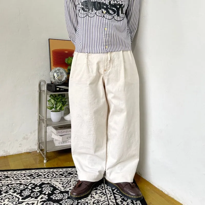 UNIQLO WHITE BAGGY JEANS LOOSE FIT photo 1