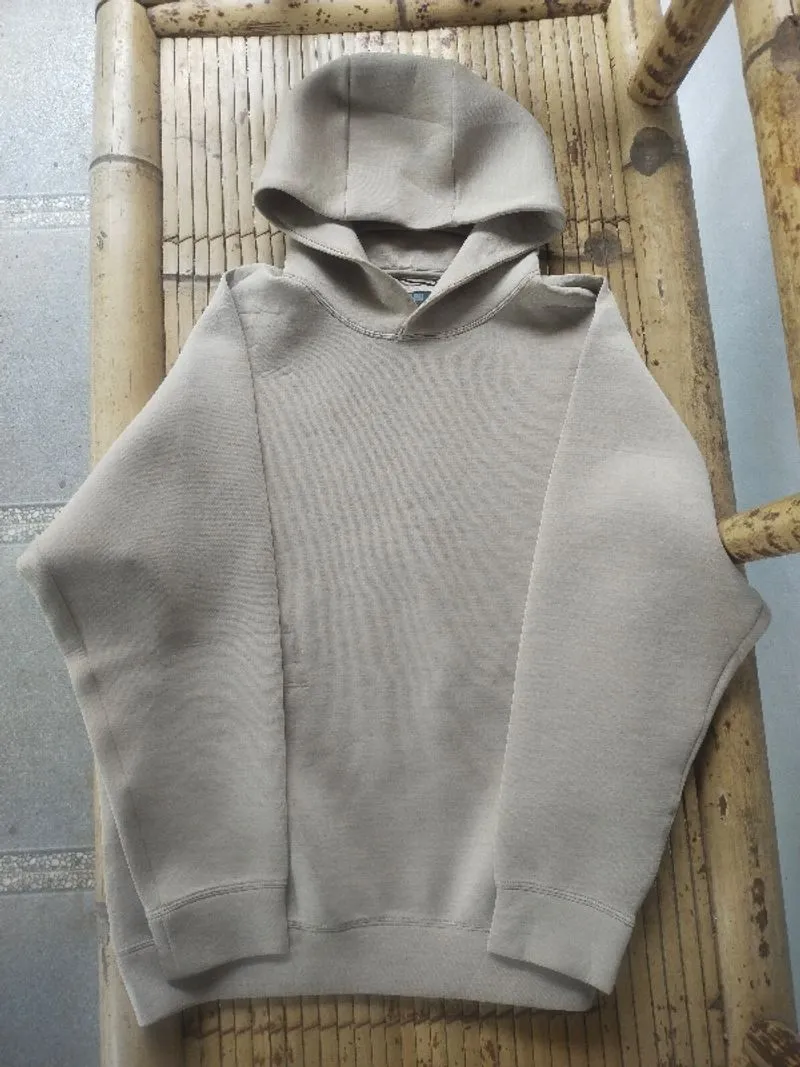 Hoodie Uniqlo warna light grey photo 1