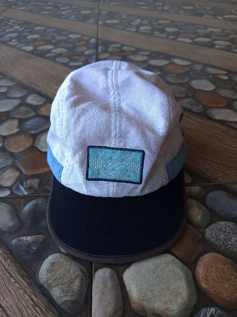 white and blue five-panel hat with black brim and "FASTCO" l photo 1