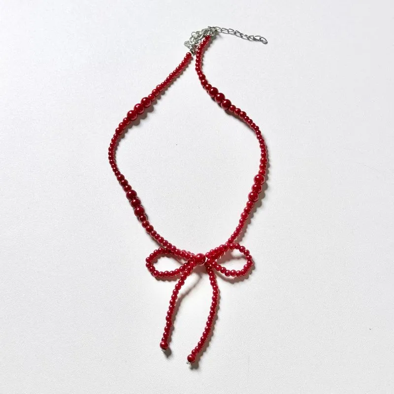 Red Ribbon Pearl Necklace photo 1