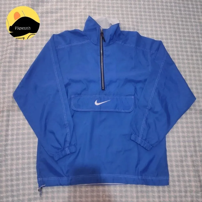 Jaket windbreaker nike vintage cagoule size L center logo photo 1