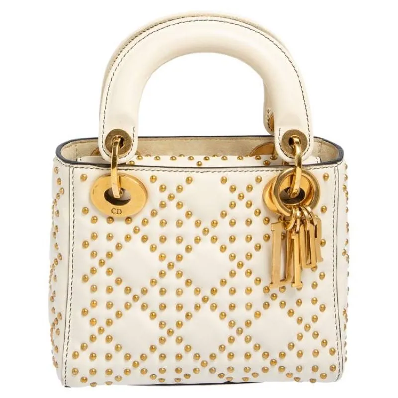 PRELOVED DIOR STUD BROKEN WHITE  photo 1