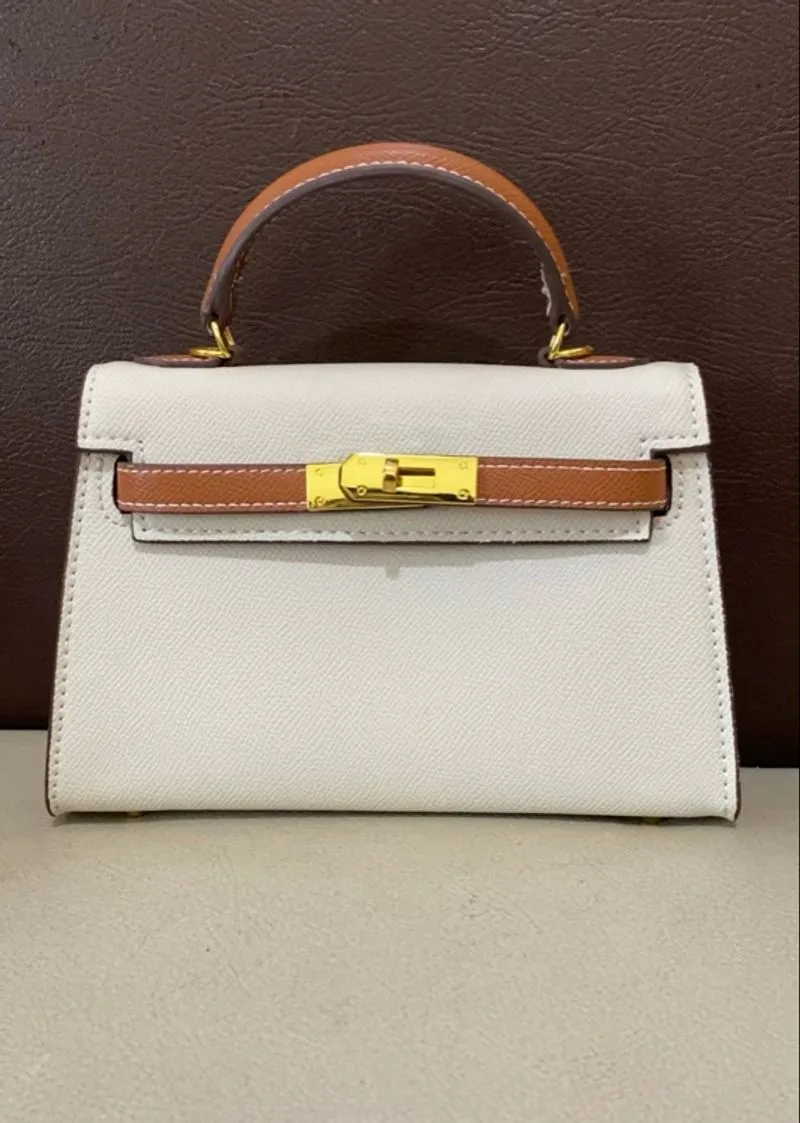 Herm* mini photo 1