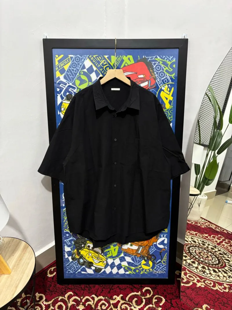 kemeja pria hitam lengan pendek gu global uniqlo photo 1