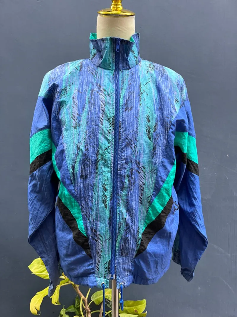Windbreaker vintage asics photo 1