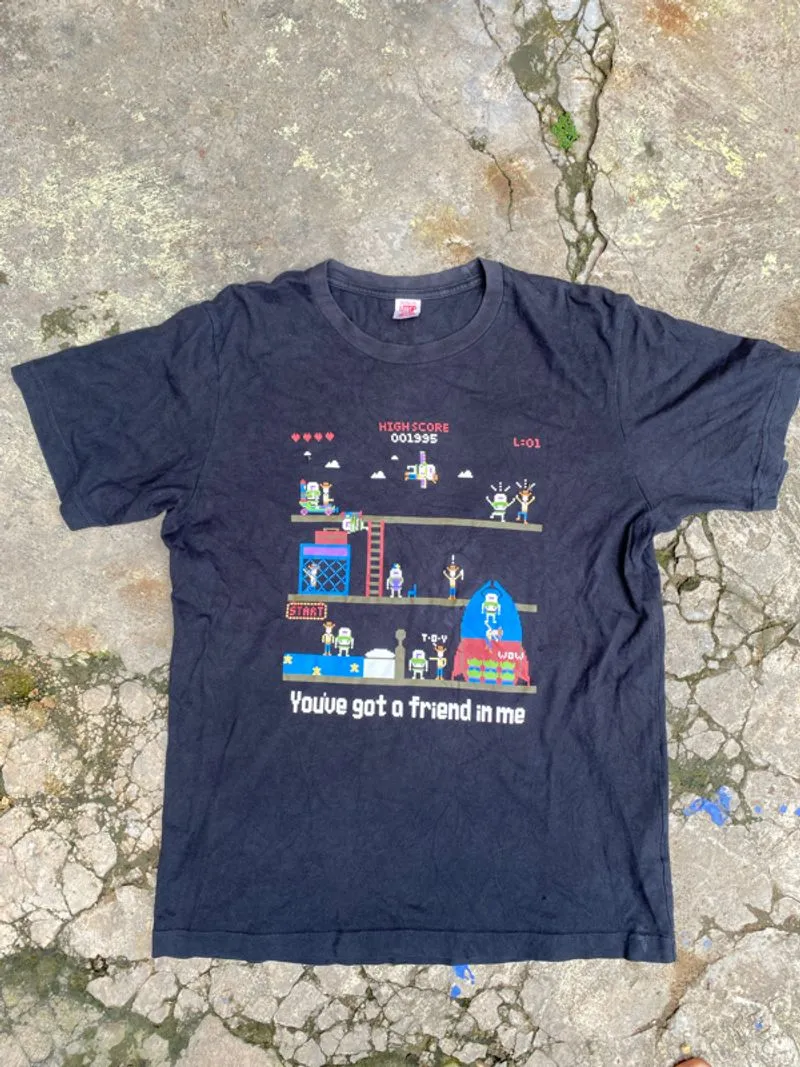 RARE] Kaos Uniqlo UTGP x Disney Pixar "Toy Story 8-Bit Game" photo 1