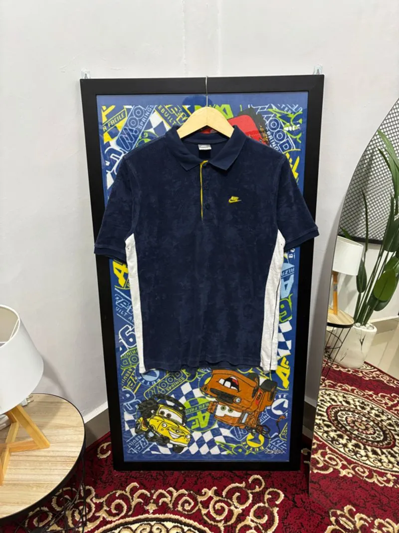 polo shirt kaos pria nike photo 1