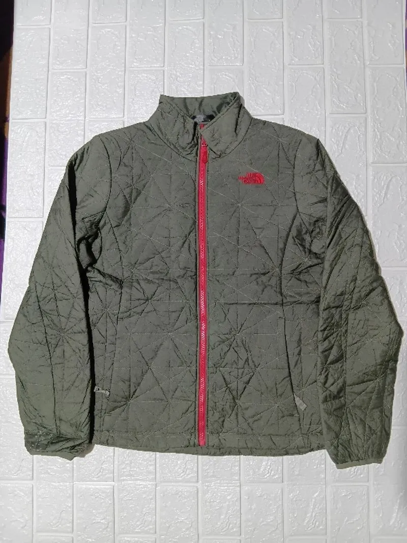 The north face puffer women series photo 1