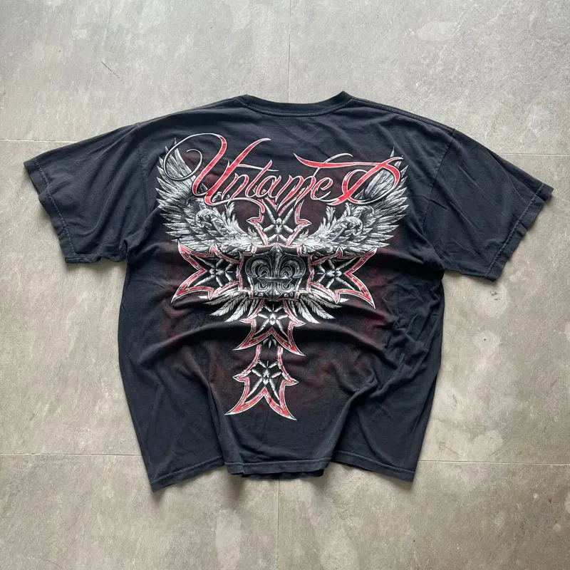 Y2K UNTAMED SKULL CROSS TRIBAL photo 1