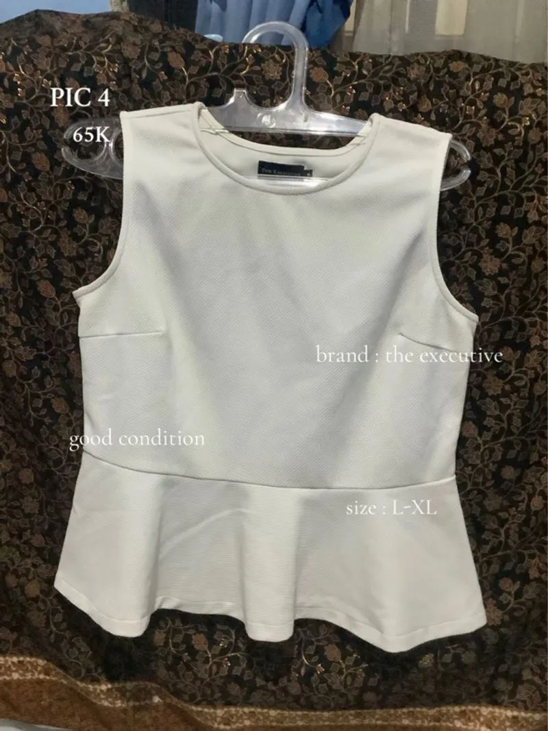 White Sleeveless photo 1