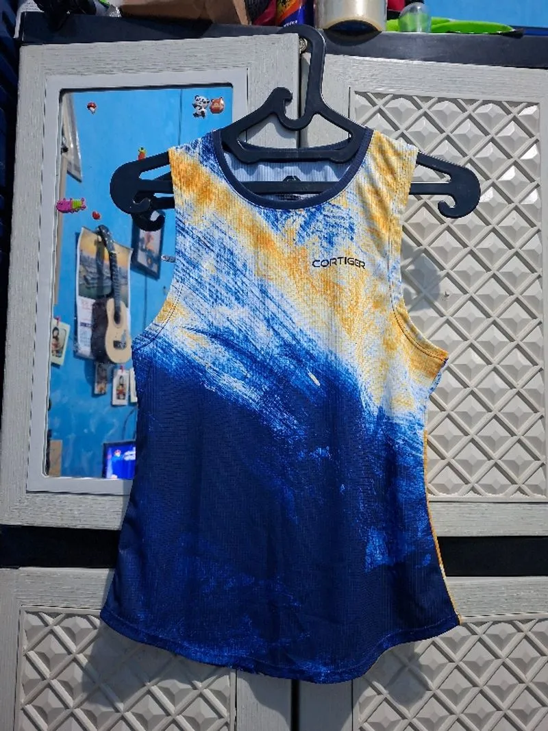 Cortiger baju sport photo 1