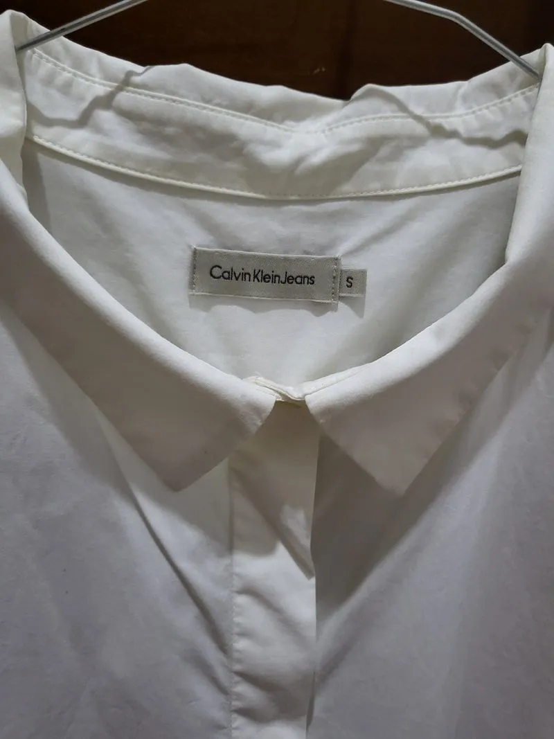 Calvin klein kemeja putih photo 1