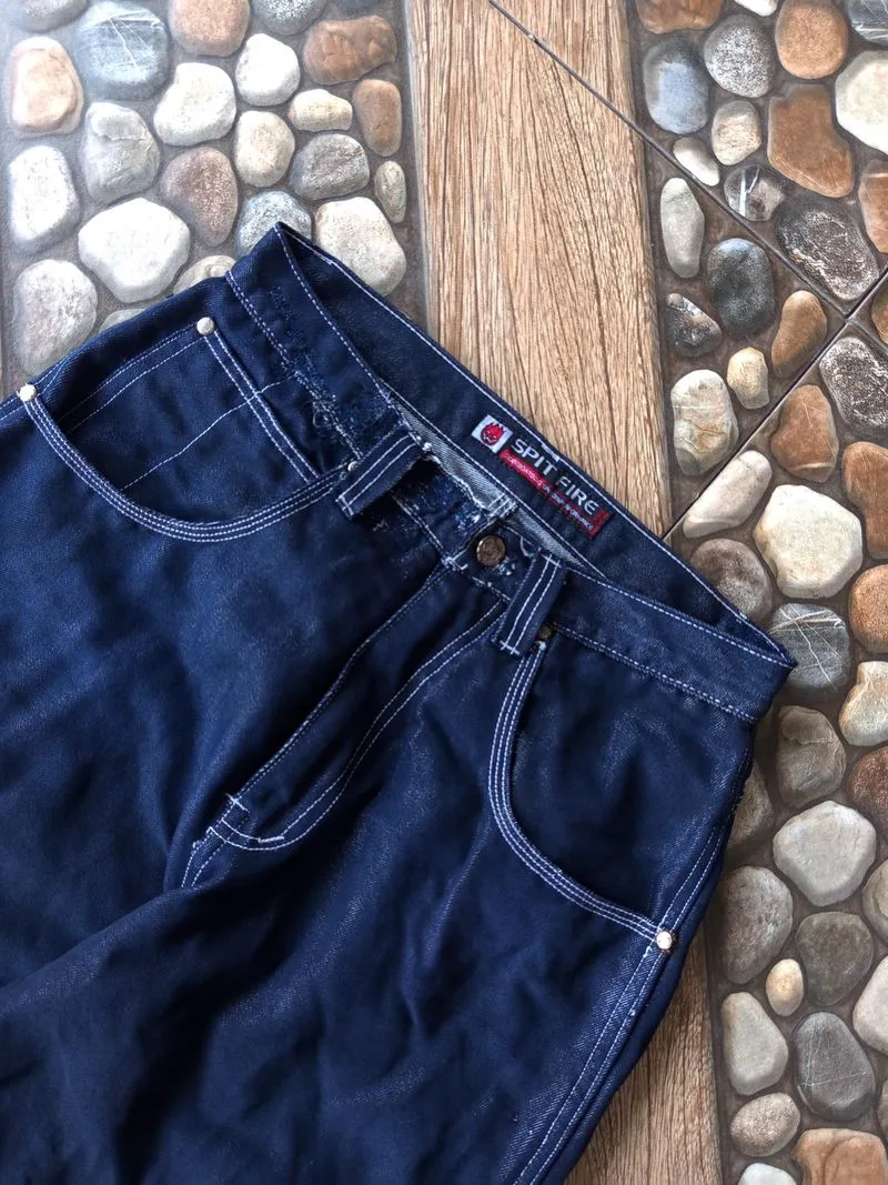 These pants are Spitfire Baggy Jeans, a premium denim produc photo 1