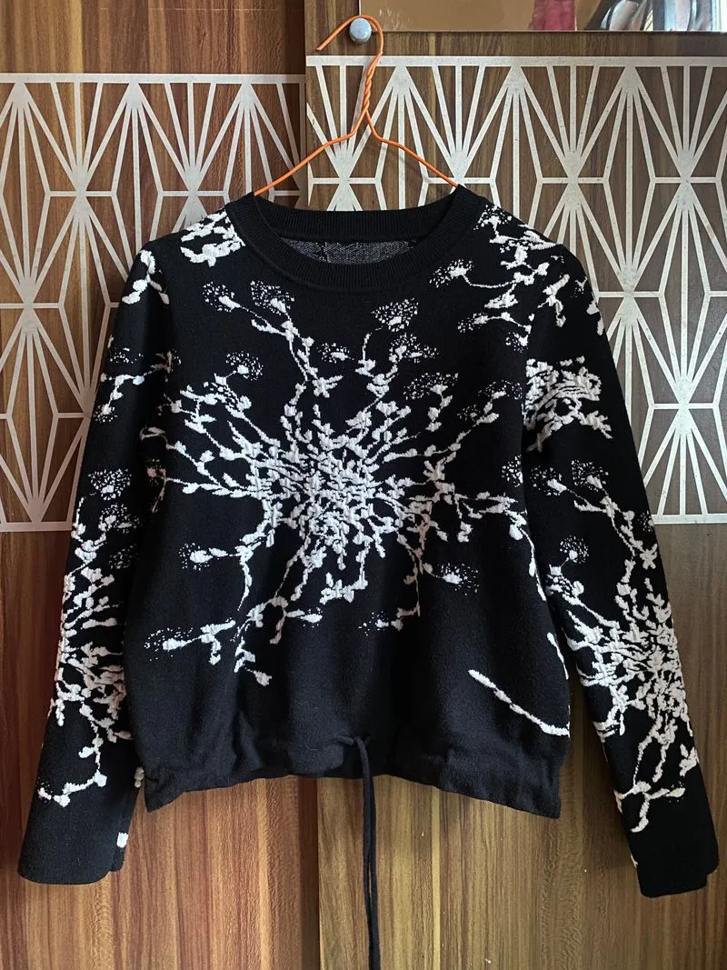Baju Sweater Motif photo 1