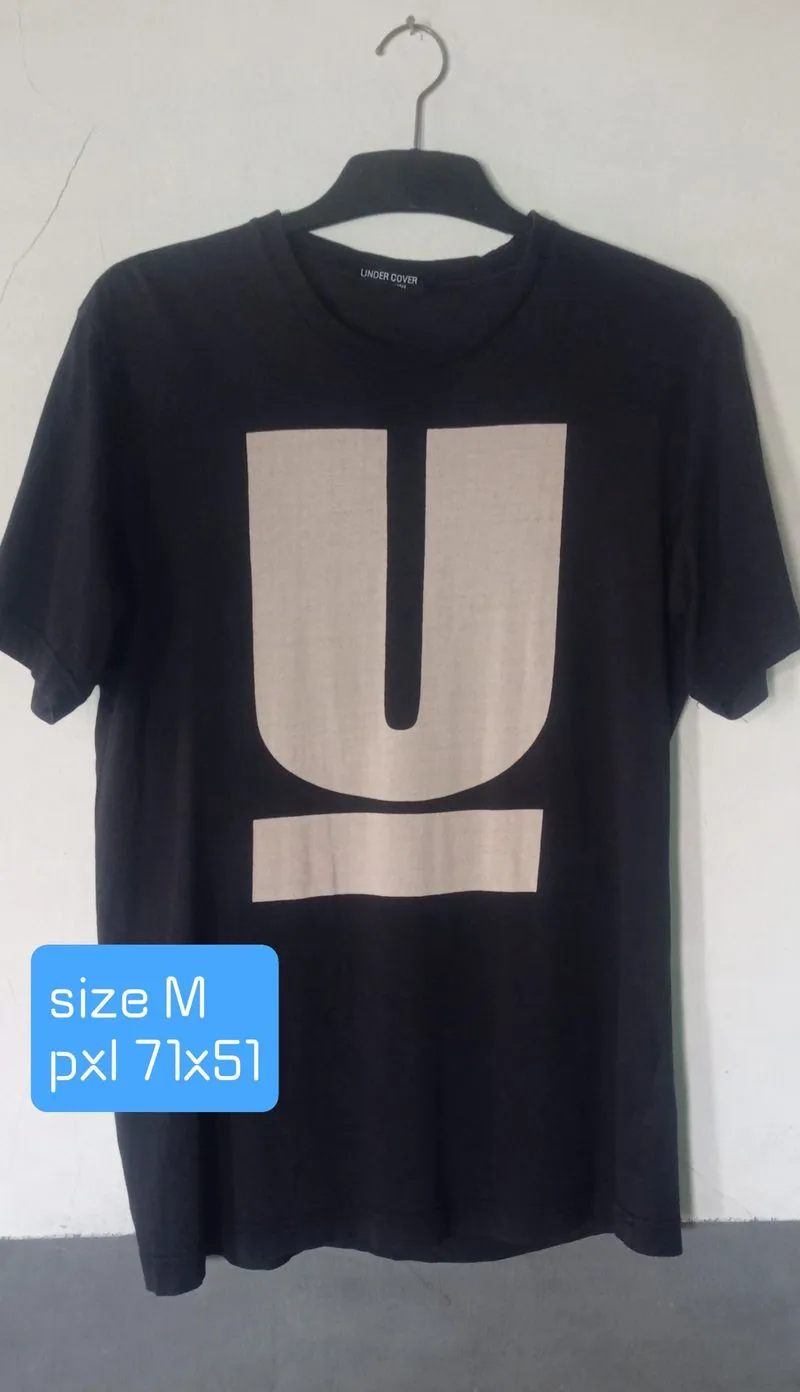 Undercover big logo photo 1