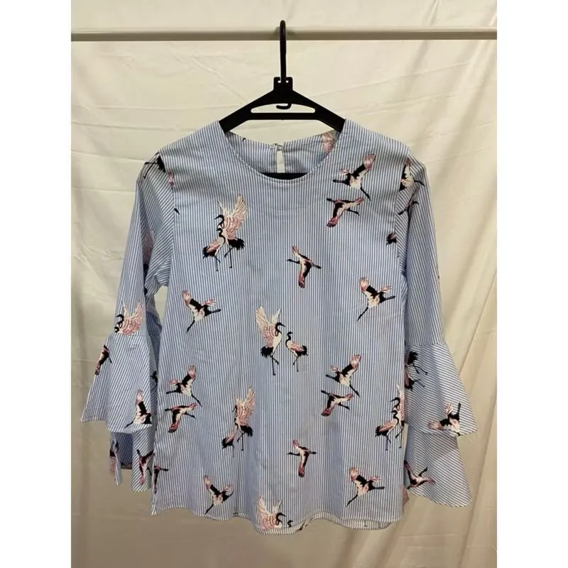 Blouse ruffle photo 1