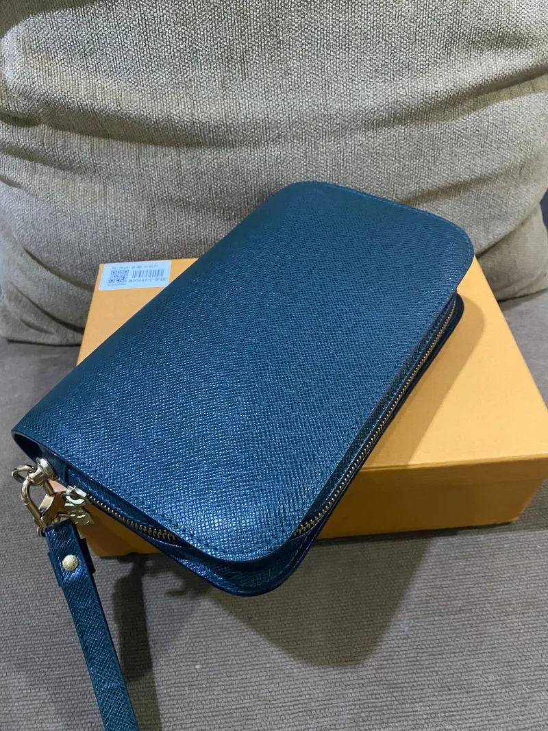 Handbag pouch louis vuitton green taiga leather ori net pri photo 1