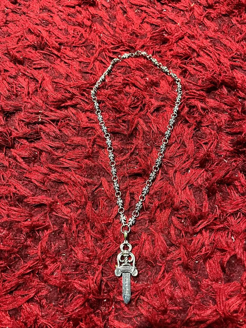 dagger roxello ch necklace photo 1
