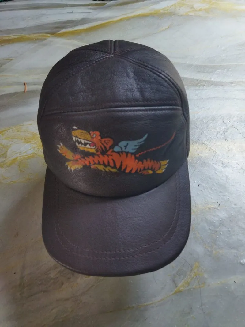 LEATHER CAPS photo 1