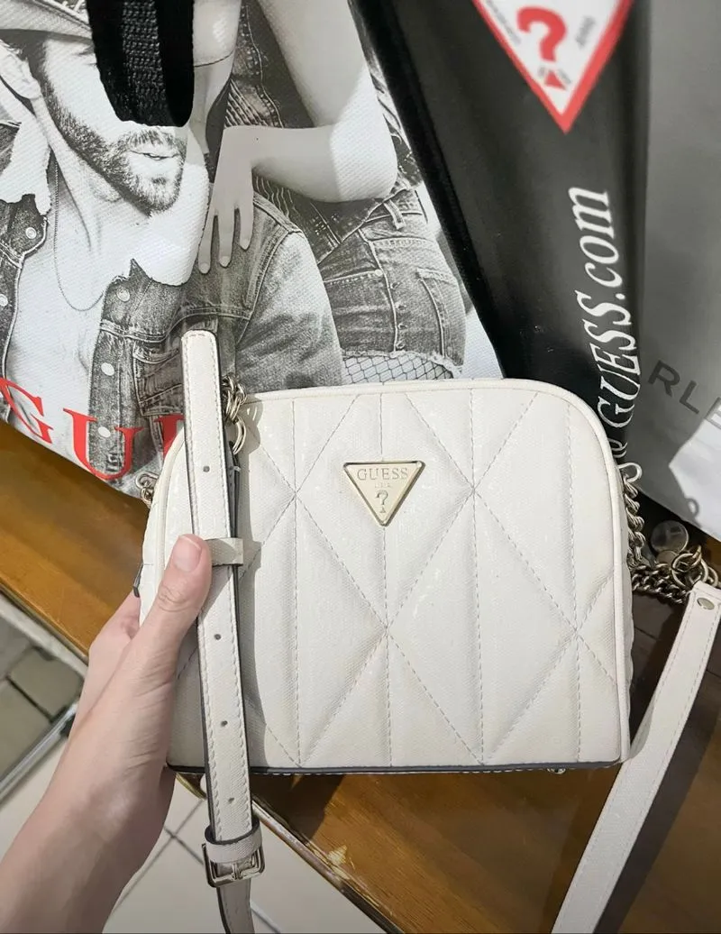 off-white crossbody bag is the Guess Betula Women's Crossbod photo 1