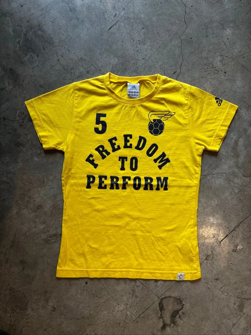Adidas yellow t-shirt with "5 FREEDOM TO PERFORM photo 1